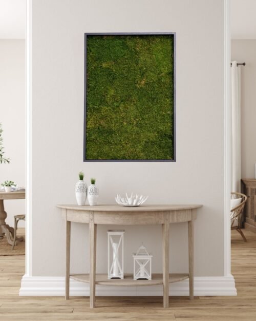 Neliönmuotoinen sammaltaulu, joka on valmistettu aidosta säilötystä tasasammaleesta, luoden modernin viherseinän.